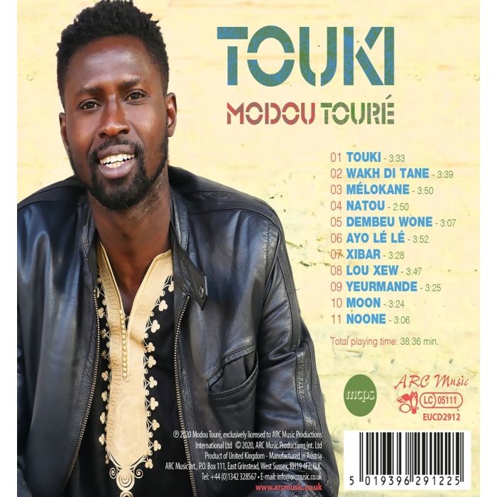 Moudou Touré: Touki - slide-1